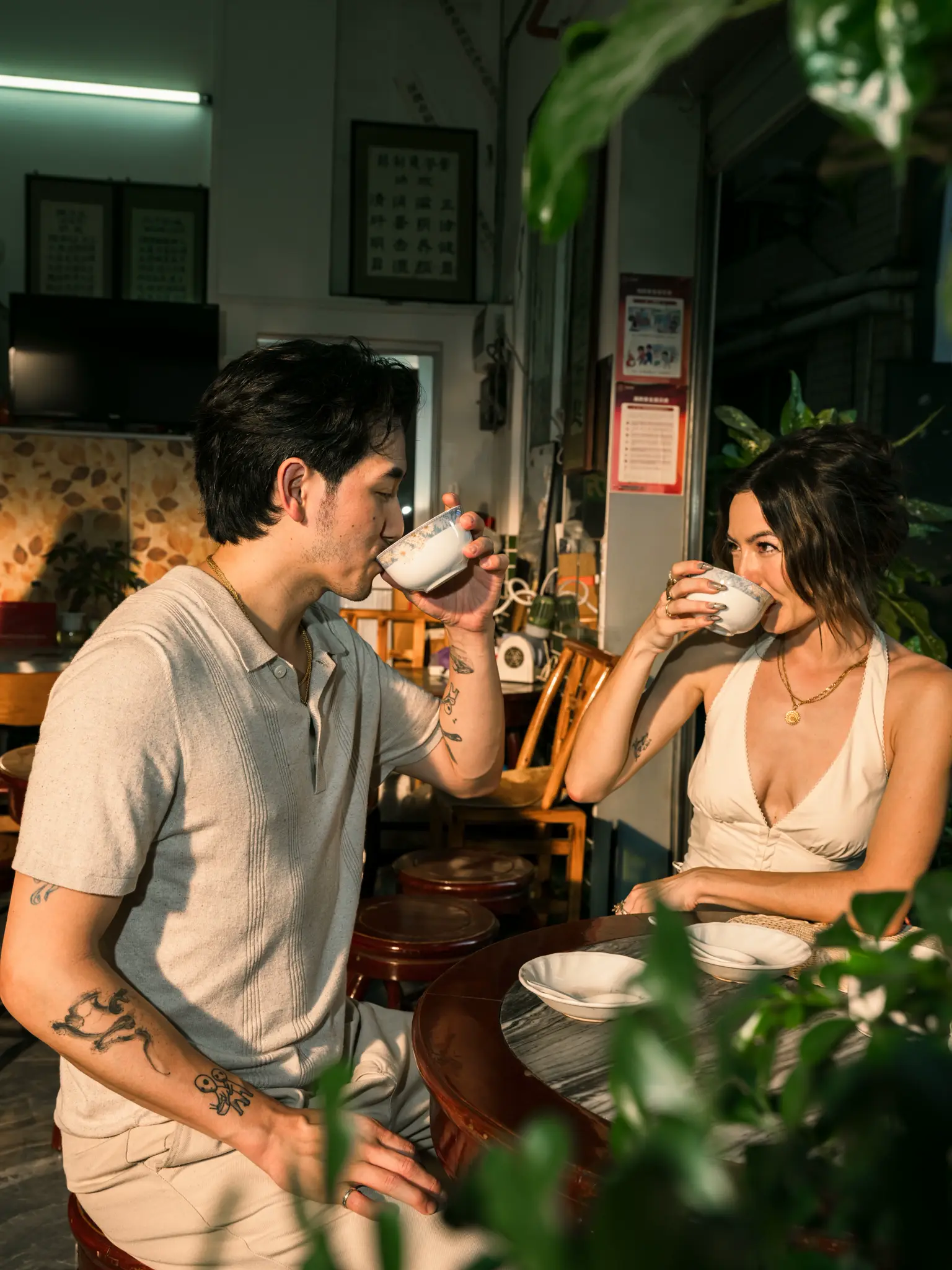 Ewa and Jeromy Ko sharing tea in a Shenzhen restaurant